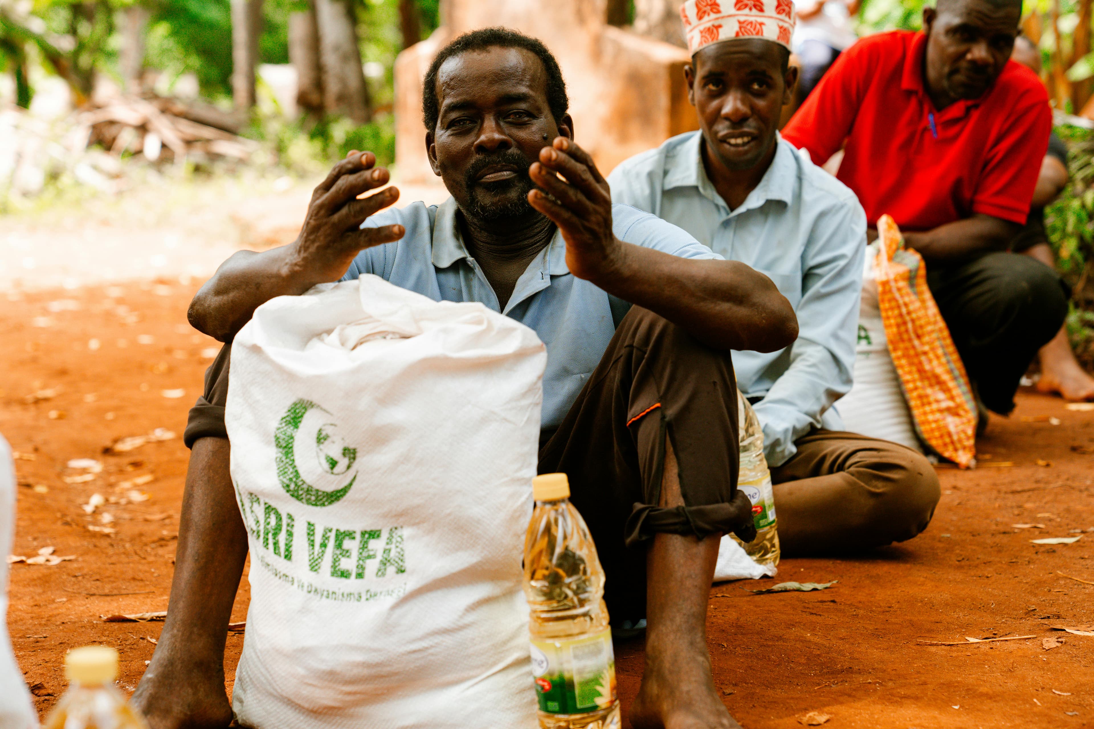 Community members receiving food support